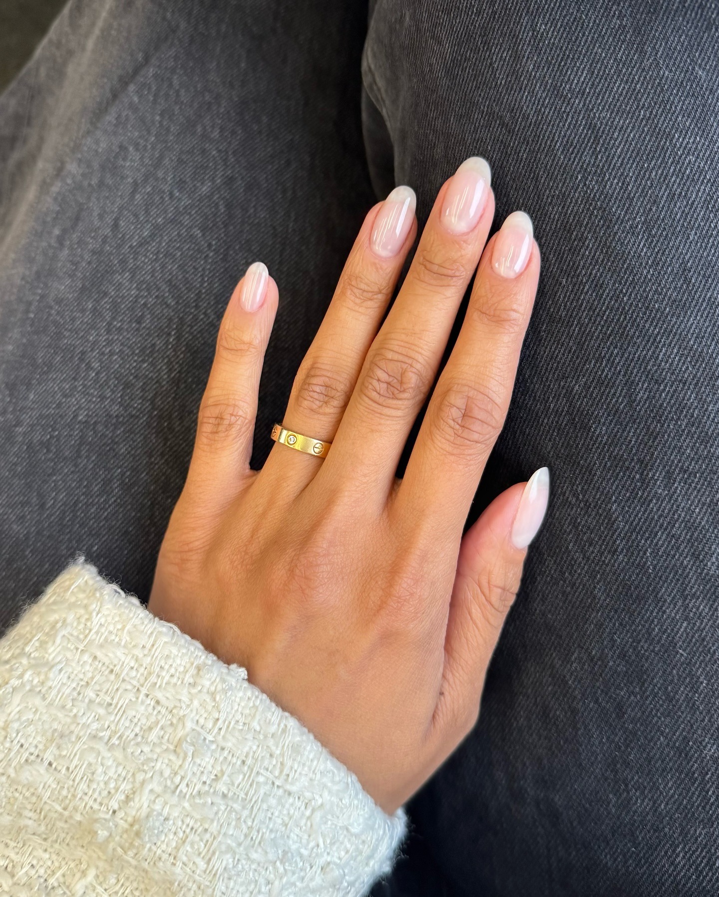 Person wearing milky white jelly nail polish.