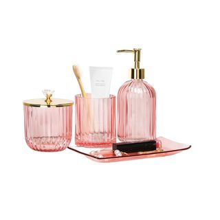 Pink set of bathroom accessories