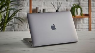The 2020 MacBook Air, one of the best student laptops, on a desk