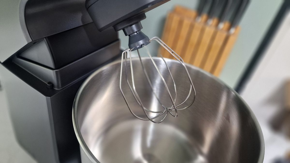 The Ooni Halo Pro Spiral mixer being tested in a green and white kitchen