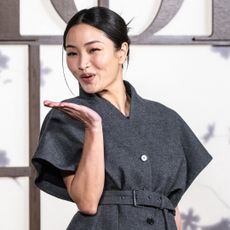 Anna Sawai wears a Dior skirt suit at the Dior pre-fall show