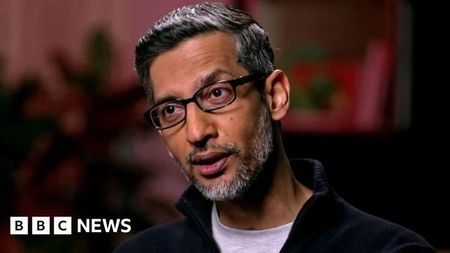 Google CEO Sundar Pichai talking on the BBC, with a BBC logo in the bottom-left corner