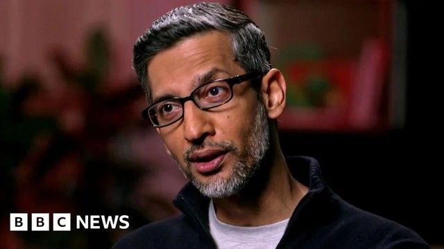 Google CEO Sundar Pichai talking on the BBC, with a BBC logo in the bottom-left corner