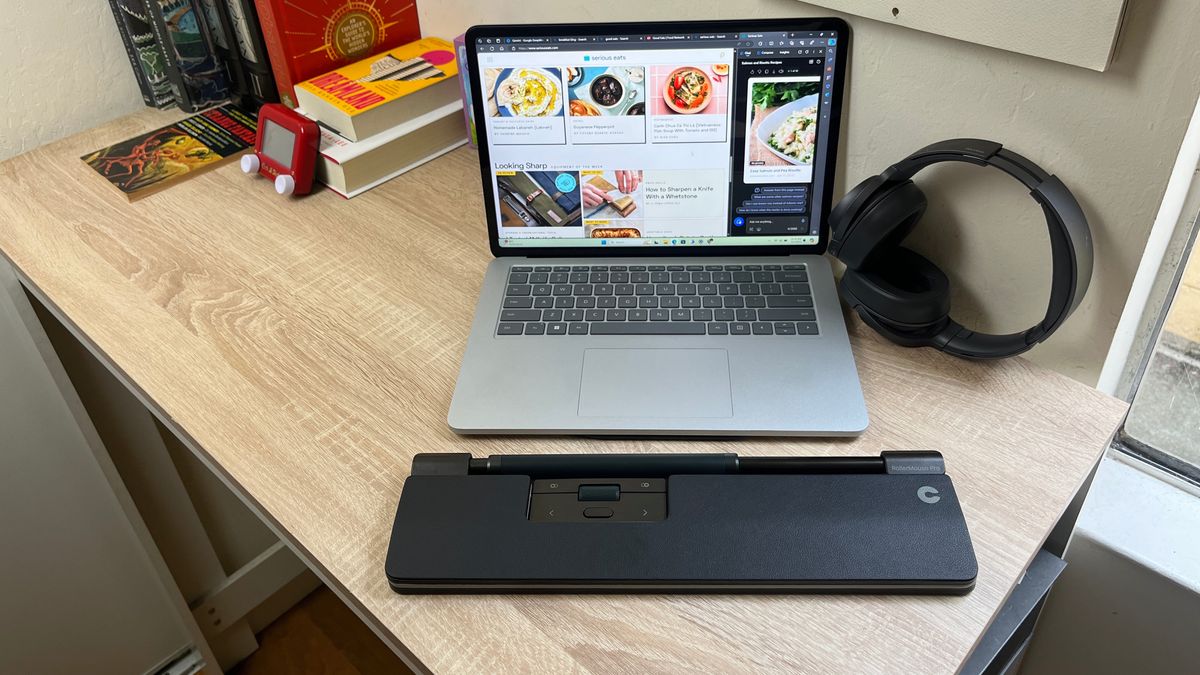 Contour Rollermouse Pro Slim on a desk in front of a laptop (unedited)