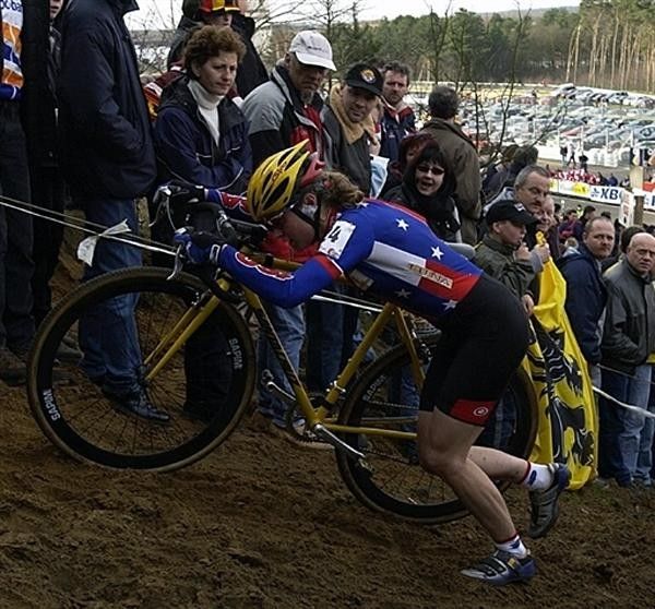 Alison Dunlap pushes her bike