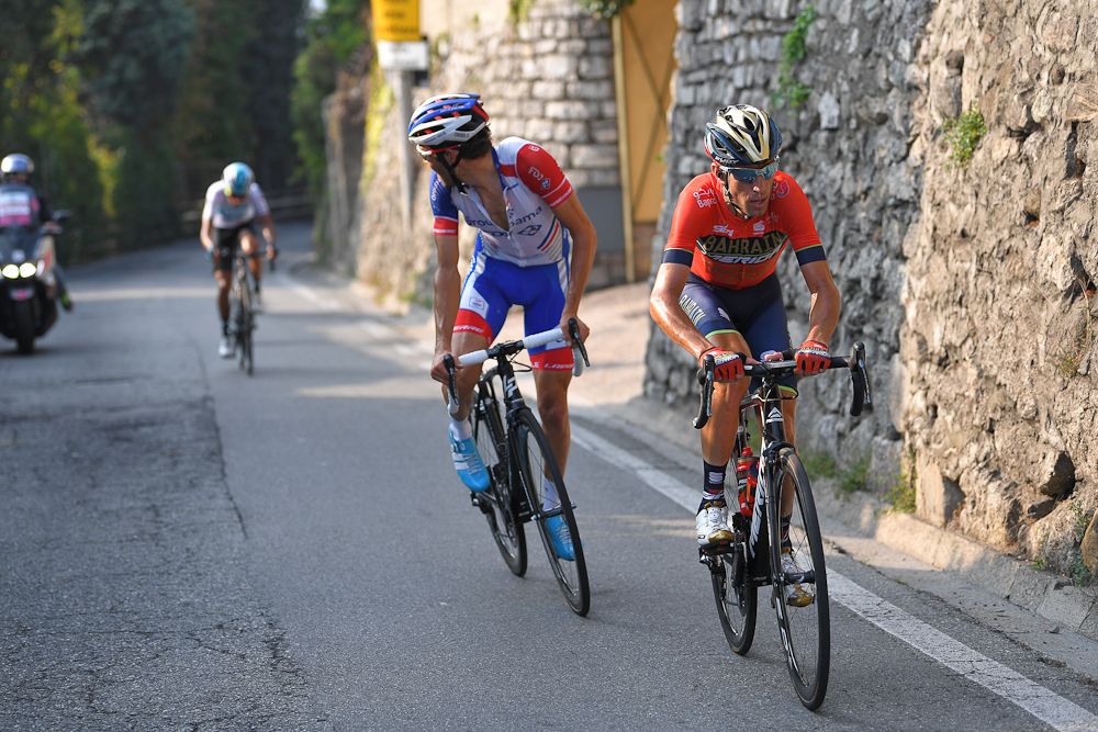 Thibaut Pinto checks for chasers as Vincenzo Nibali drives the pace near the end of Il Lombardia