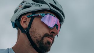 Peter sagan wears a pair of bright tie dye 100% S3 sunglasses