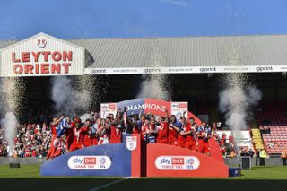 Leyton Orient players celebrate after winning League Two in April 2023.