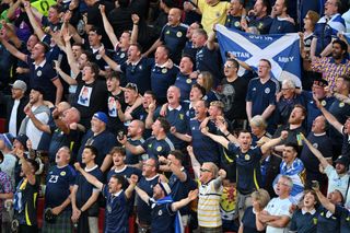 Fans of Scotland show their support prior to the UEFA EURO 2024 group stage match between Scotland and Switzerland at Cologne Stadium on June 19, 2024 in Cologne, Germany. (