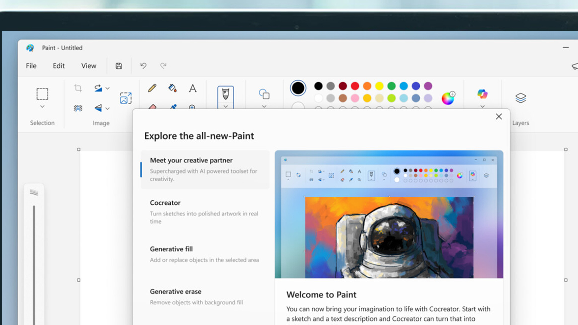 A laptop screen showing Microsoft Paint