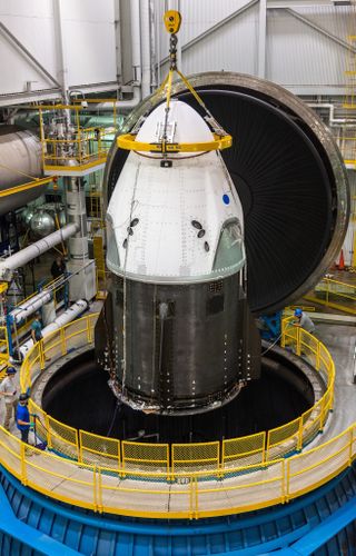 SpaceX's first Crew Dragon spacecraft is prepared to undergo testing at the In-Space Propulsion Facility of NASA's Plum Brook Station in Sandusky, Ohio on June 13, 2018.