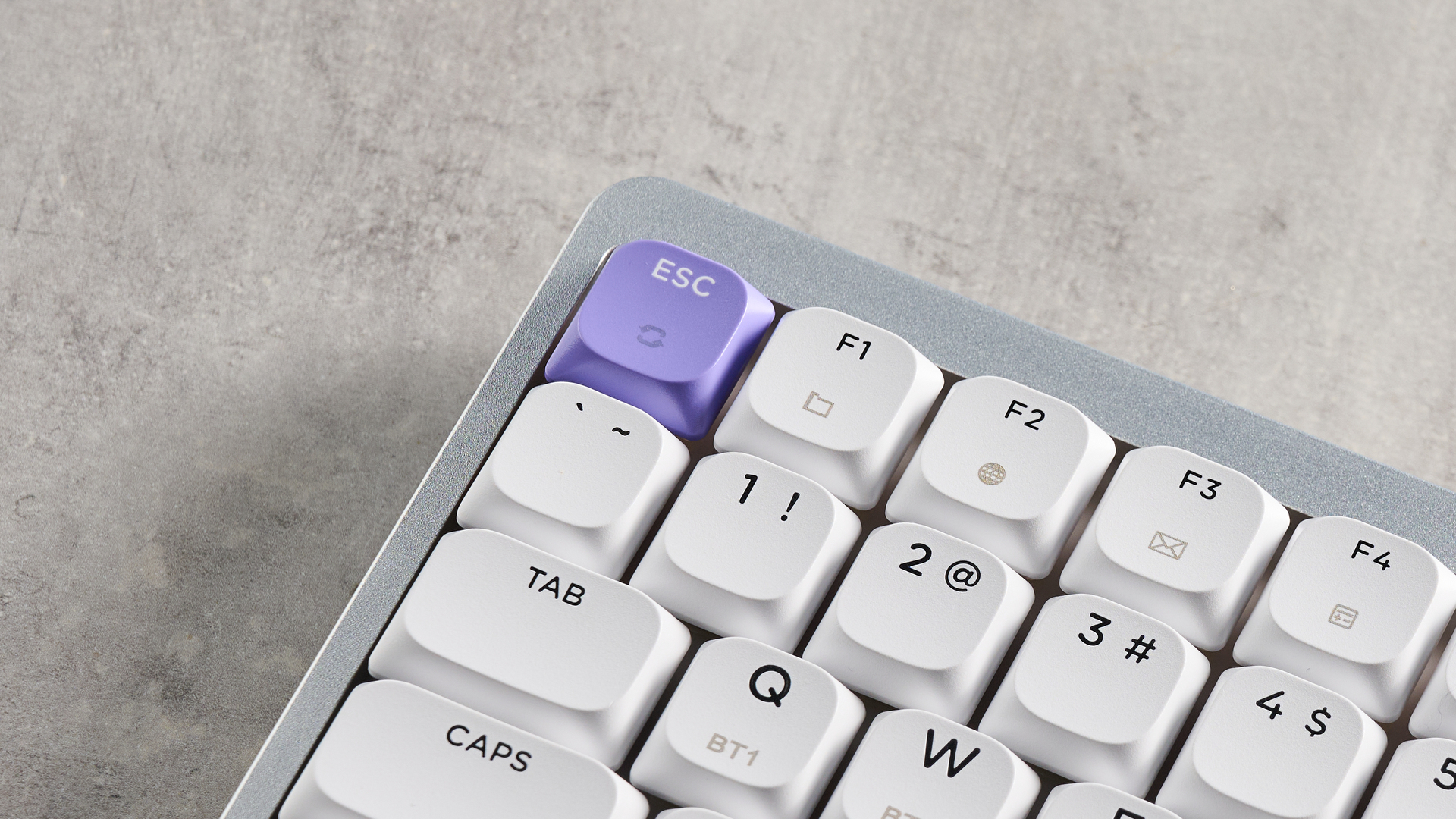 A white and purple Epomaker Luma84 low-profile mechanical keyboard