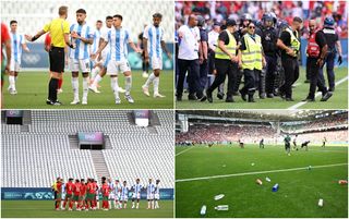 Referee Glenn Nyberg interacts with players from both teams during the Men&#039;s group B match between Argentina and Morocco during the Olympic Games Paris 2024 at Stade Geoffroy-Guichard on July 24, 2024 in Saint-Etienne, France. (Photo by Tullio M. Puglia/Getty Images)