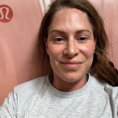 Health writer Anna Bartter trying the Pilates roll like a ball move every day, lying on her yoga mat post workout