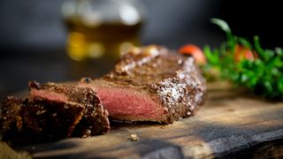 Steak on a wooden chopping board