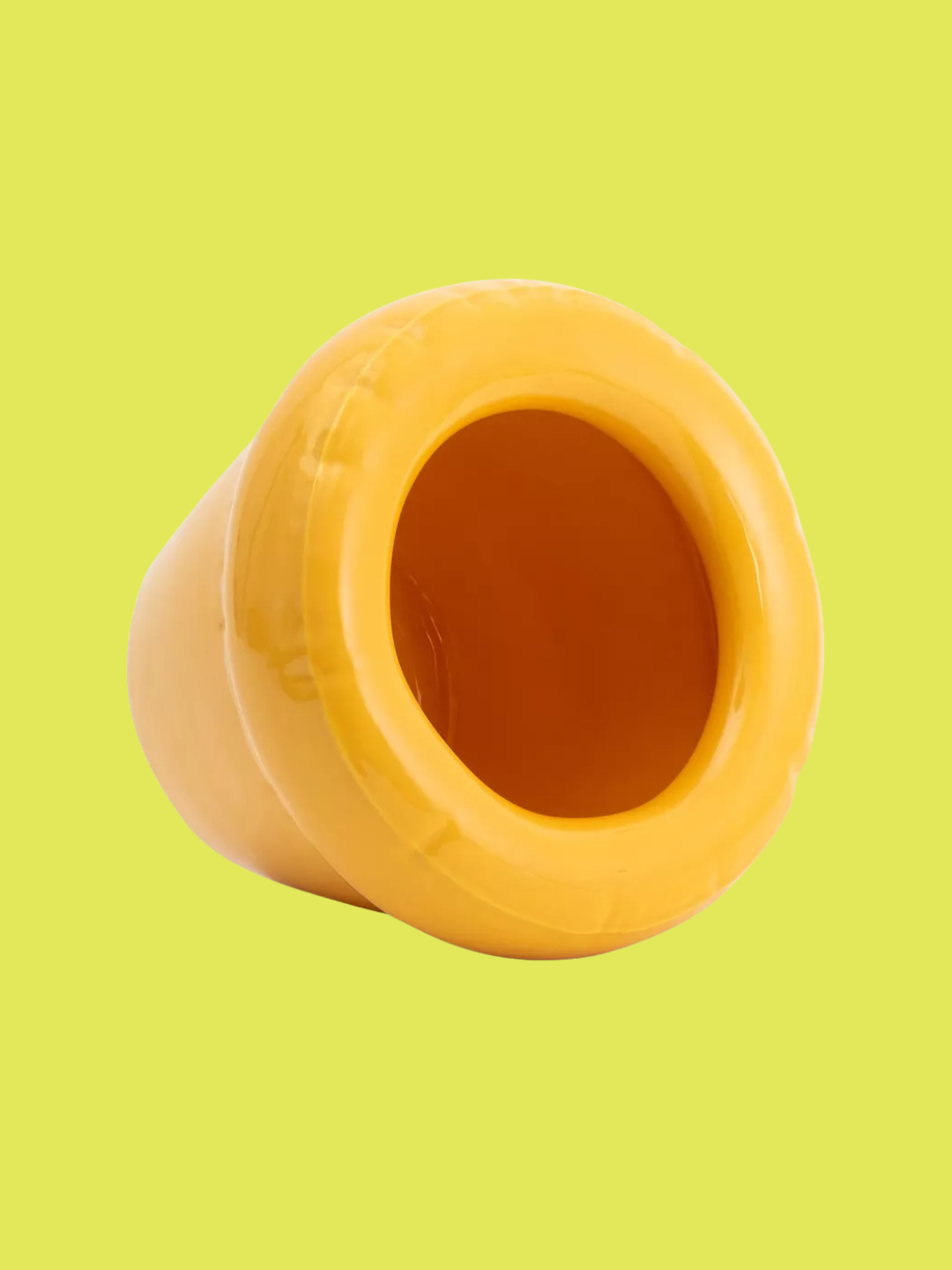 A yellow inflated-style plant pot from Home Studyo
