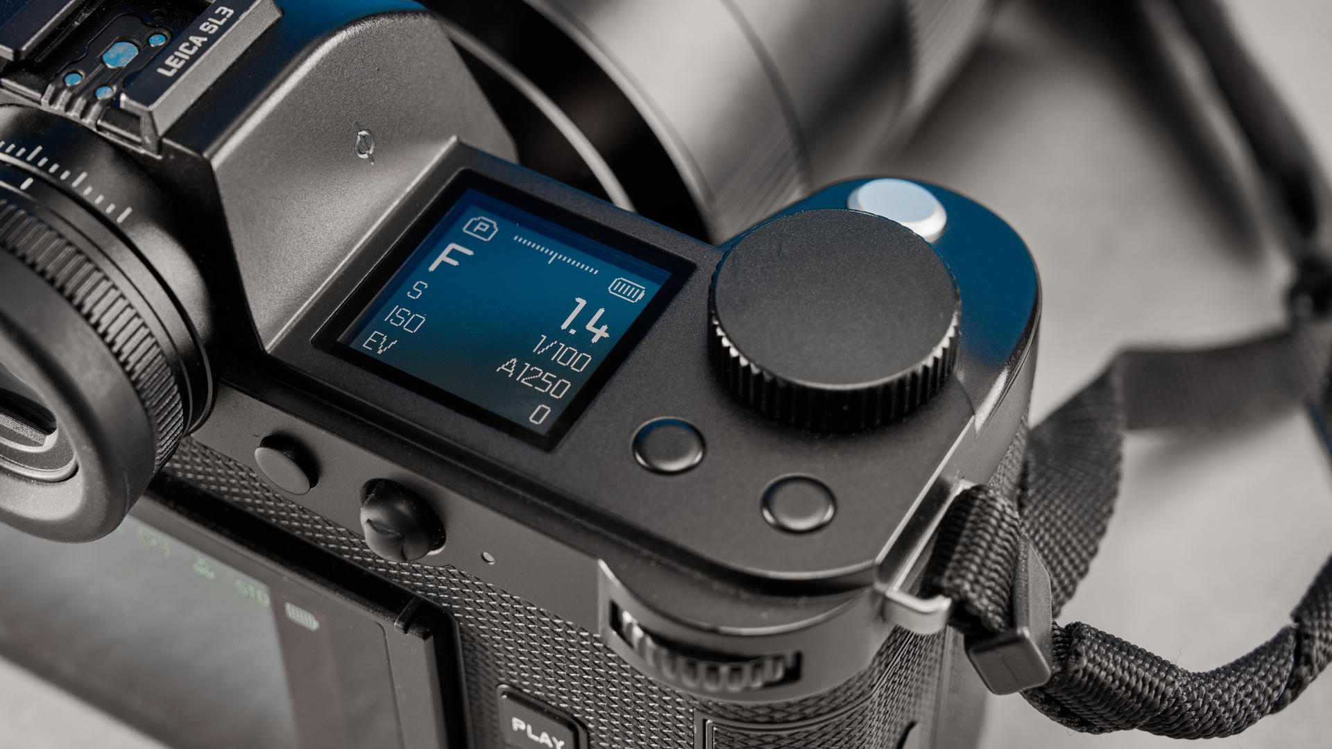 A black Leica SL3 mirrorless full frame camera