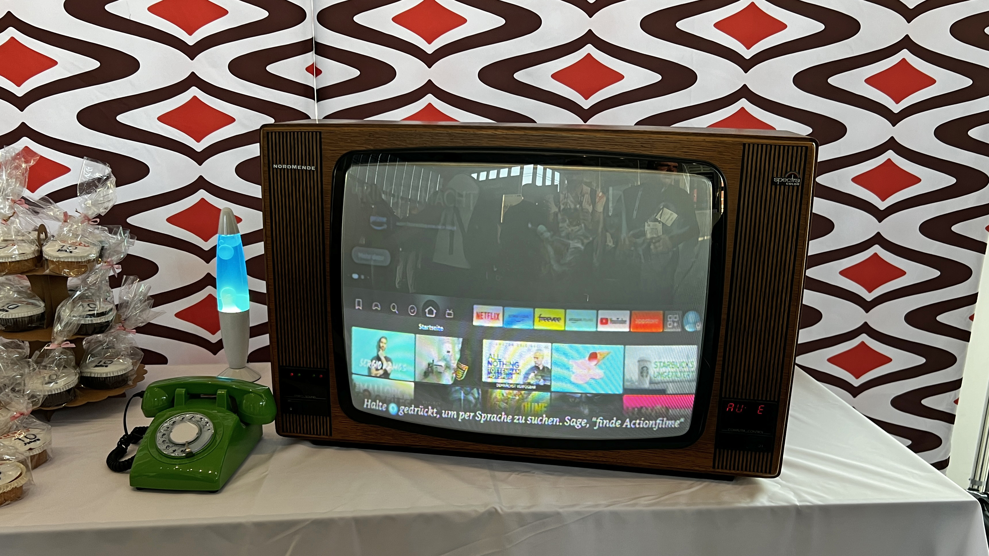 An old CRT TV with Amazon's Fire TV interface on it