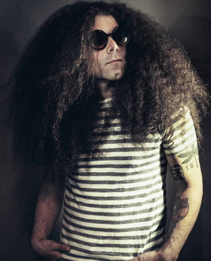 Coheed and Cambria s Claudio Sanchez Talks Drug Raids Hair Care