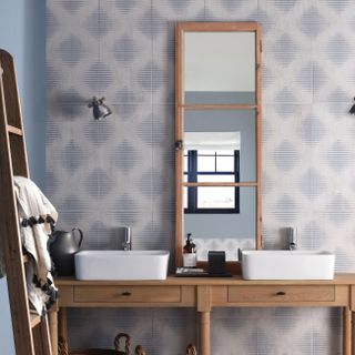 Small bathroom with wooden vanity unit and diagonal tiles