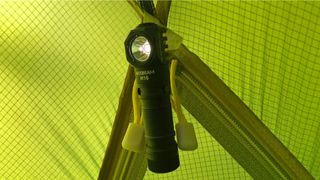 AceBeam H16 headlamp being used to light a tent