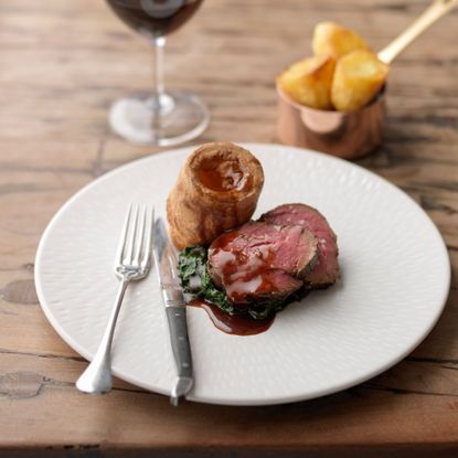 Treacle cured beef with yorkshire pud photo
