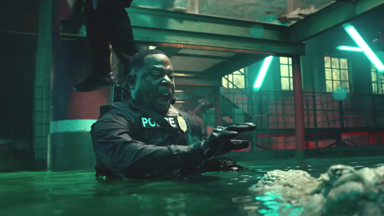 Martin Lawrence reaches out while trying to command Duke the Alligator in Bad Boys: Ride or Die.