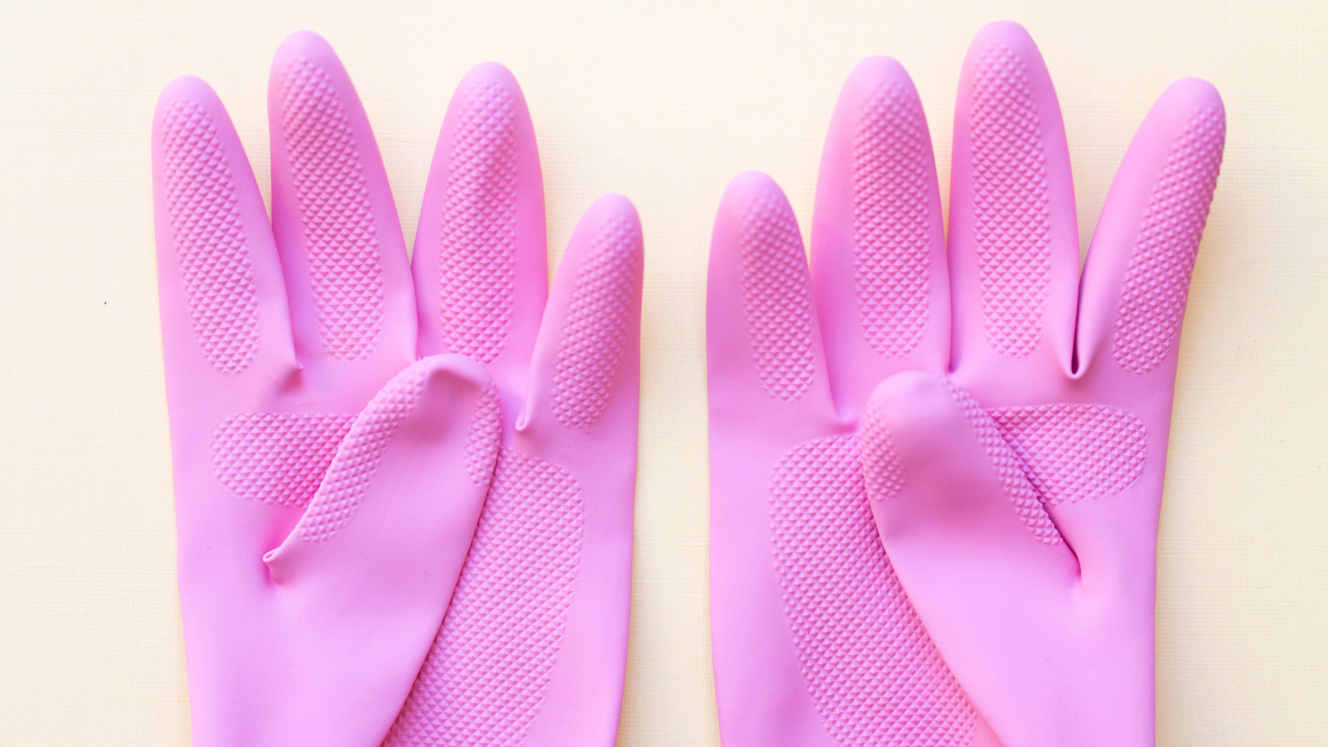 Pair of pink rubber gloves