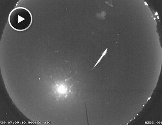 A fireball from a Southern Delta Aquarid meteor streaks over one of the network cameras in July 2010 in this still image from a NASA video camera.