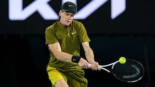 Jannik Sinner hits a backhand during the Australian Open 2026.