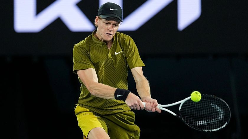 Jannik Sinner hits a backhand during the Australian Open 2026.