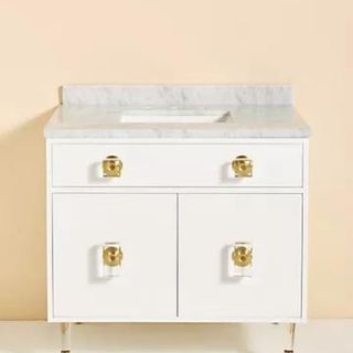 Lacquered Regency Vanity against a blush background.
