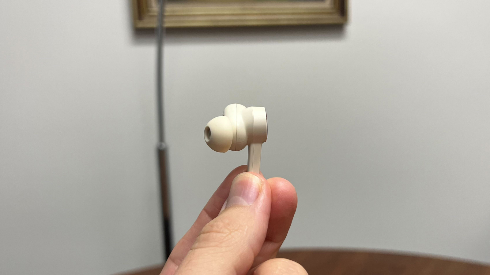 B&O Beoplay EX left earbud in profile