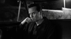 Black and white photo of Andrew Scott as Tom Ripley