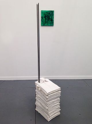 Doris Saicedo’s sculpture of cloth shirts, metal bars and plaster are on show at the White Cube stand