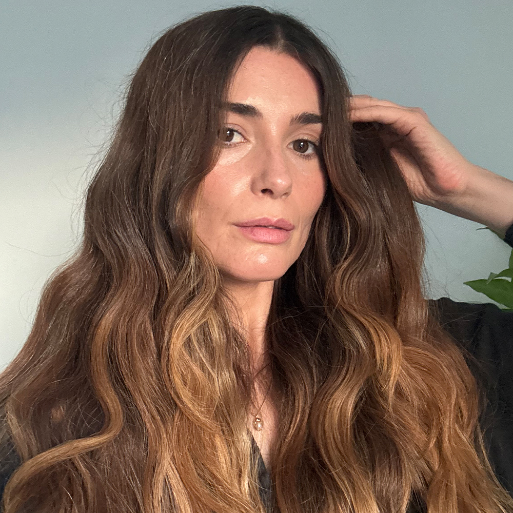 Eleanor Vousden with a wavy hairstyle