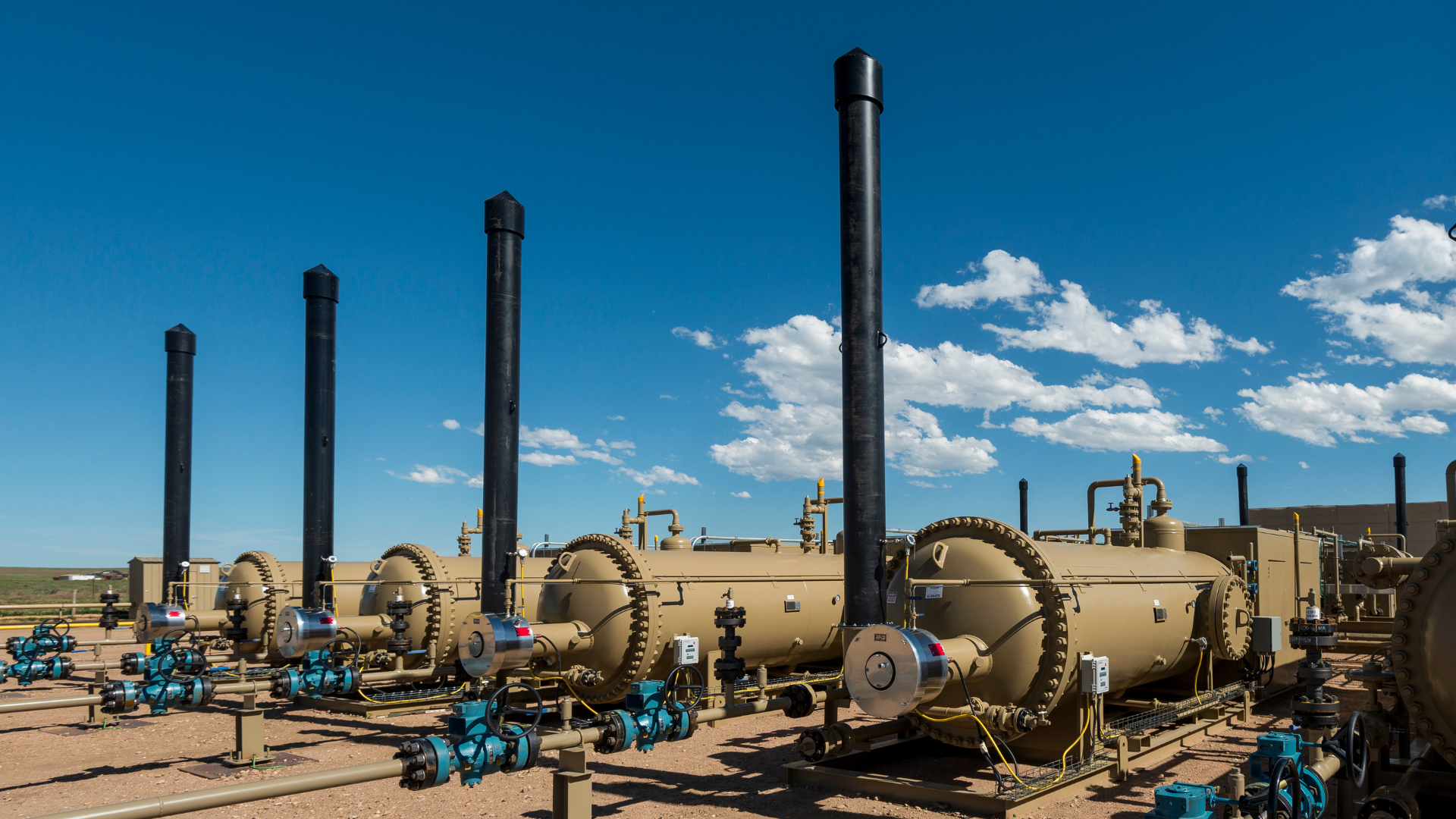 a row of separation vessels for natural gas production