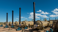 a row of separation vessels for natural gas production