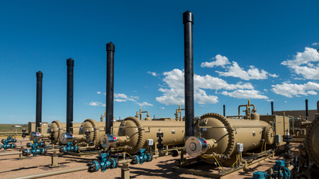 a row of separation vessels for natural gas production