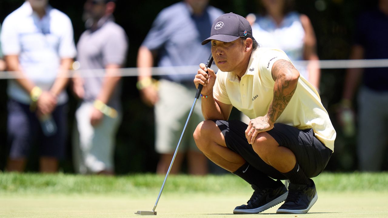 Anthony Kim lines up a putt during a LIV Golf tournament