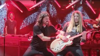Lauren onstage with Dave Grohl