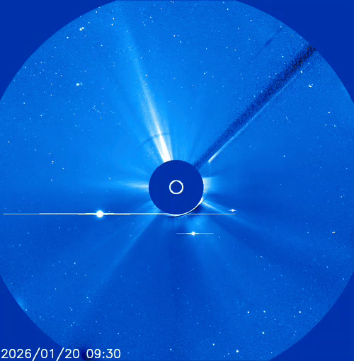 gif animation showing white flecks speed across the screen, it looks like it's snowing in space