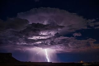 lightning strikes during a thunderstorm