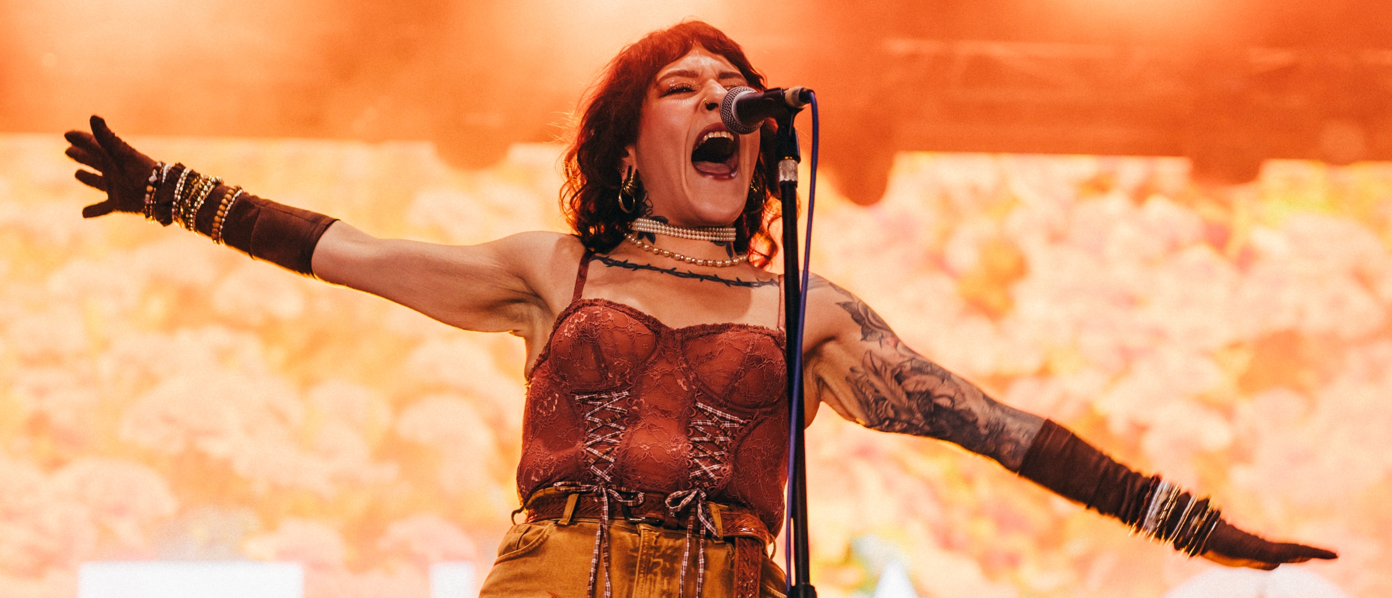 Ithaca singer Djamila Azzouz onstage in 2025