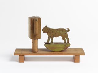 low bench, tiger on rocker and other found wooden object comprising Peter Blake sculpture