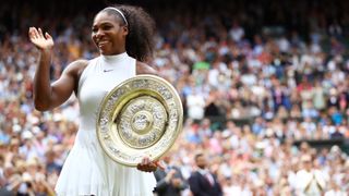 Serena Williams of The United States holds the trophy following victory in The Ladies Singles Final against Angelique Kerber of Germany on day twelve of the Wimbledon Lawn Tennis Championships at the All England Lawn Tennis and Croquet Club on July 9, 2016 in London, England.