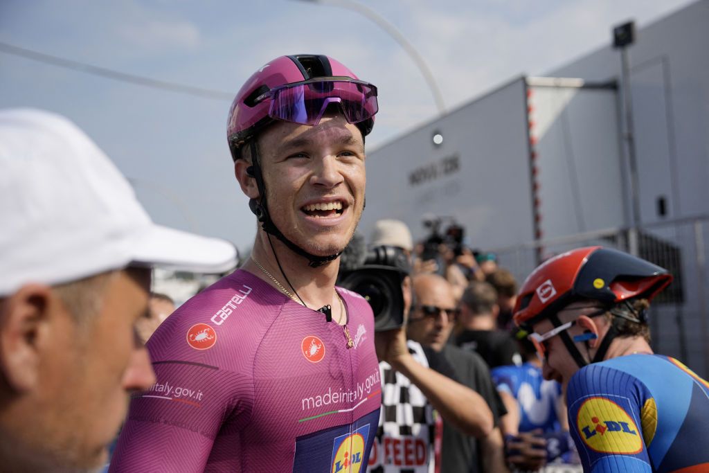 Team Lidl-Trek's Italian rider Jonathan Milan after winning the 11th stage of the 107th Giro d'Italia cycling race, 207km between Foiano di Val Fortore and Franca Villa al Mare, on May 15, 2024. (Photo by Marco Alpozzi / POOL / AFP)