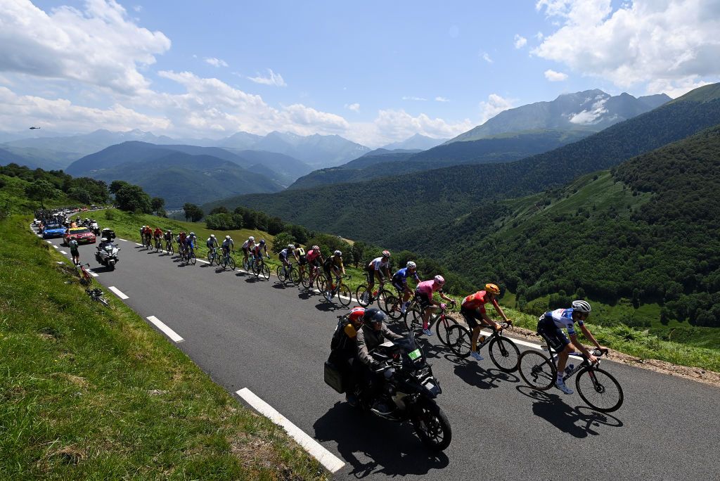 CAUTERETSCAMBASQUE FRANCE JULY 06 A general view of Wout Van Aert of Belgium and Team JumboVisma Matteo Trentin of Italy and UAE Team Emirates Michal Kwiatkowski of Poland and Team INEOS Grenadiers Neilson Powless of The United States James Shaw of United Kingdom and Team EF EducationEasyPost Julian Alaphilippe of France Kasper Asgreen of Denmark and Team Soudal Quick Step Nikias Arndt of Germany and Team Bahrain Victorious Benot Cosnefroy of France Oliver Naesen of Belgium and Ag2R Citron Team Mathieu Van Der Poel of The Netherlands and Team AlpecinDeceuninck Bryan Coquard of France Anthony Perez of France and Team Cofidis Ruben Guerreiro of Portugal Gorka Izagirre of Spain and Movistar Team Krists Neilands of Latvia and Team IsraelPremier Tech Christopher JuulJensen of Denmark and Team JaycoAlUla Matis Louvel of France and Team ArkaSamsic Tobias Halland Johannessen of Norway and Jonas Gregaard of Denmark and UnoX Pro Cycling Team compete in the breakaway climbing to the Col dAspin 1490m during the stage six of the 110th Tour de France 2023 a 1449km stage from Tarbes to CauteretsCambasque 1355m UCIWT on July 06 2023 in CauteretsCambasque France Photo by Tim de WaeleGetty Images