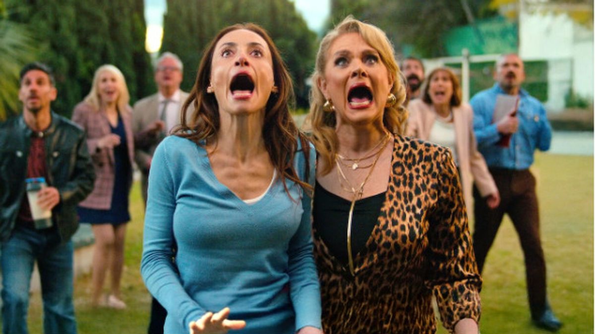 An image from Welcome to the Family showing to women screaming