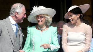 King Charles, Queen Camilla and Meghan Markle